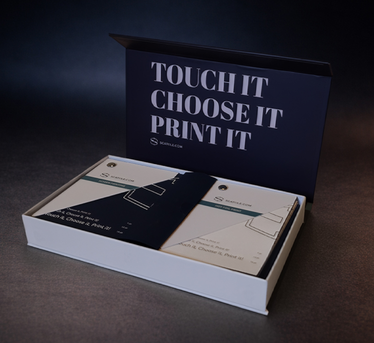 The Scatole.com sample pack, open, with paper swatches inside