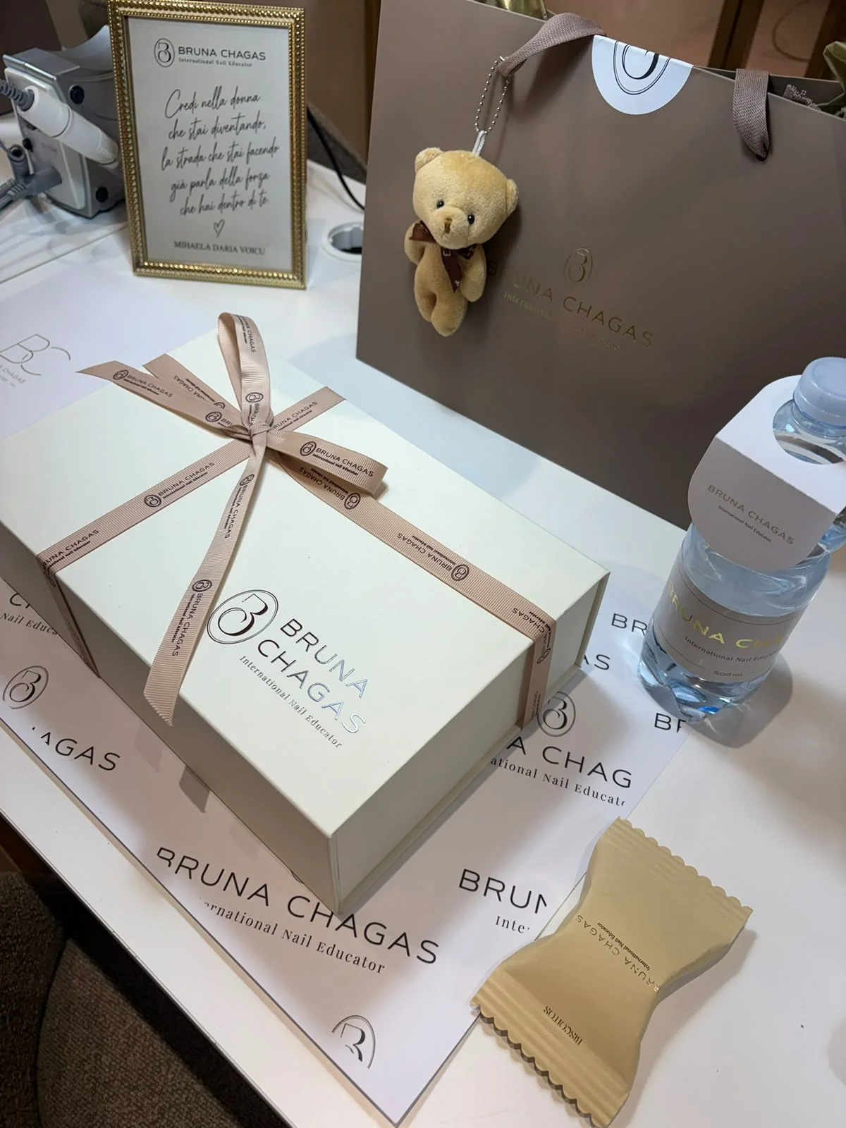 Bruna Chagas branded magnetic box displayed at a nail education event