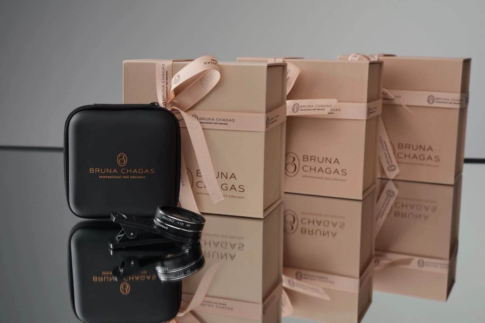 Bruna Chagas magnetic boxes and branded accessory kits arranged as a complete collection