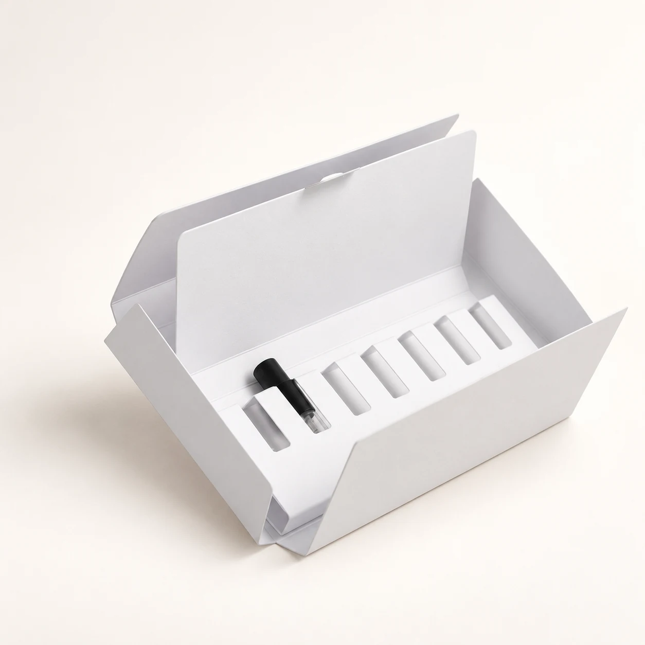A compact folding carton with dedicated vial compartments.